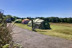 Electric hardstanding and grass ensuite pitch (Medlyn Meadows)