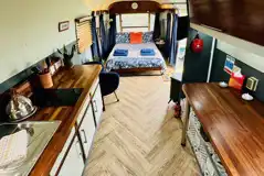 Wildview trailer double bed and living/kitchen area
