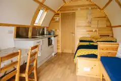 Glamping pod with hot tub interior 