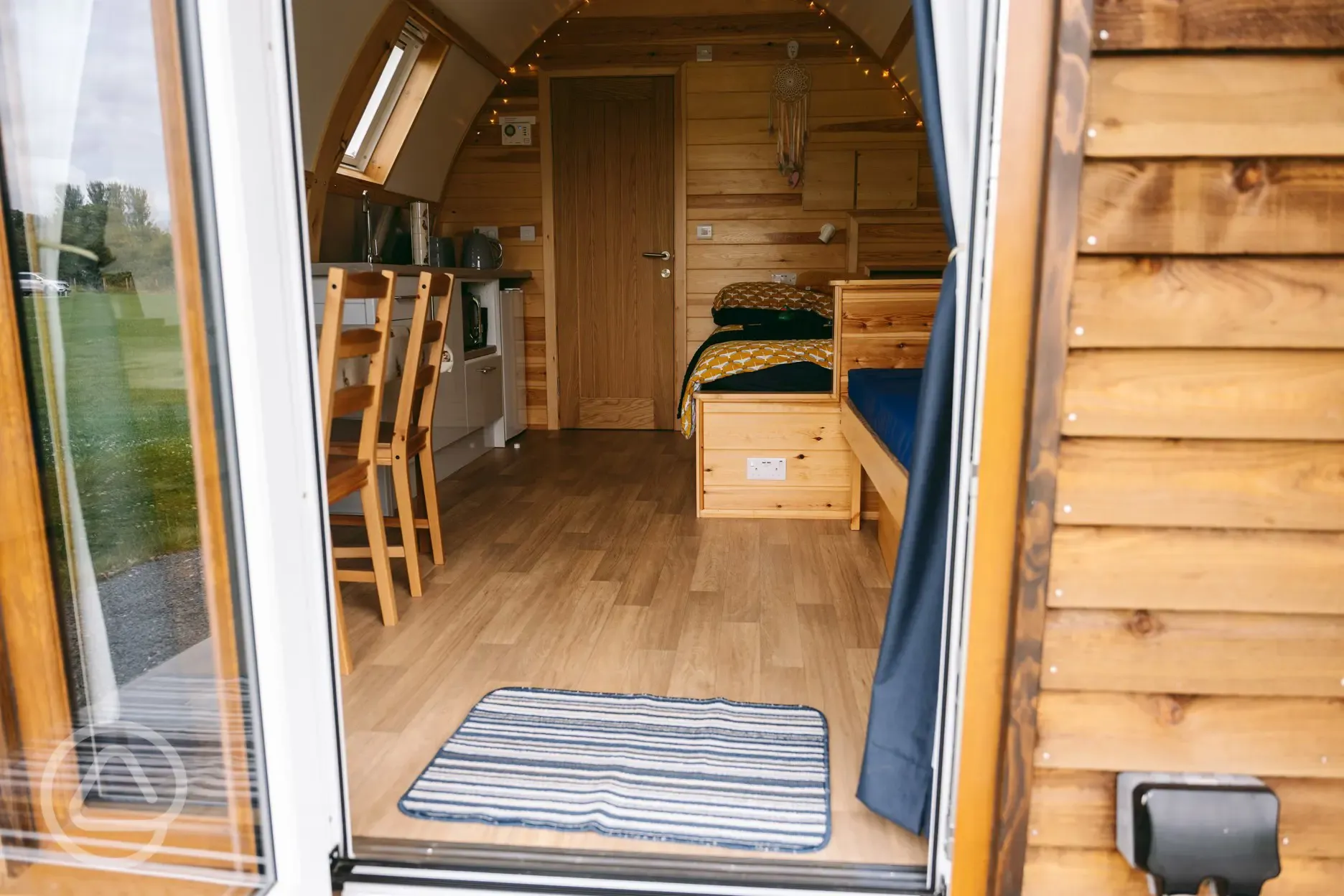 Glamping pod with hot tub interior 