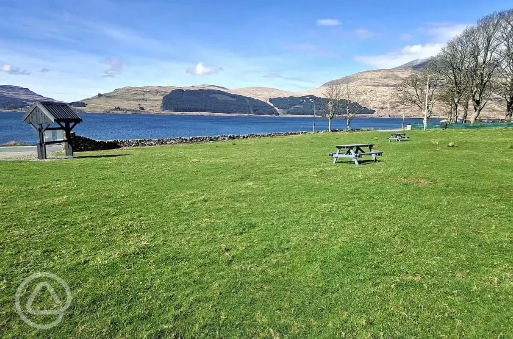Picnic benches by the loch
