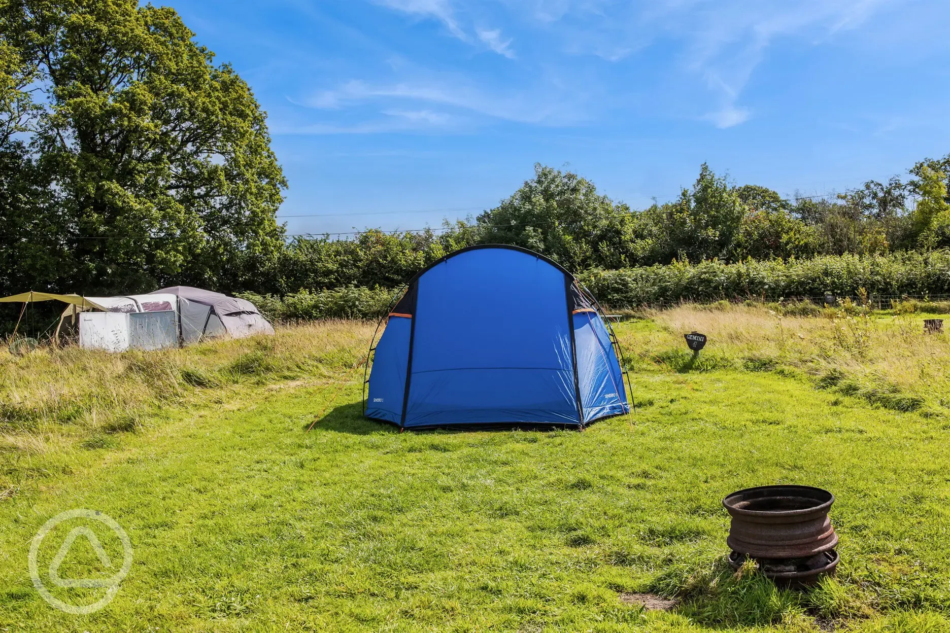 Spacious non electric grass tent pitches Spacious non electric grass tent pitches
