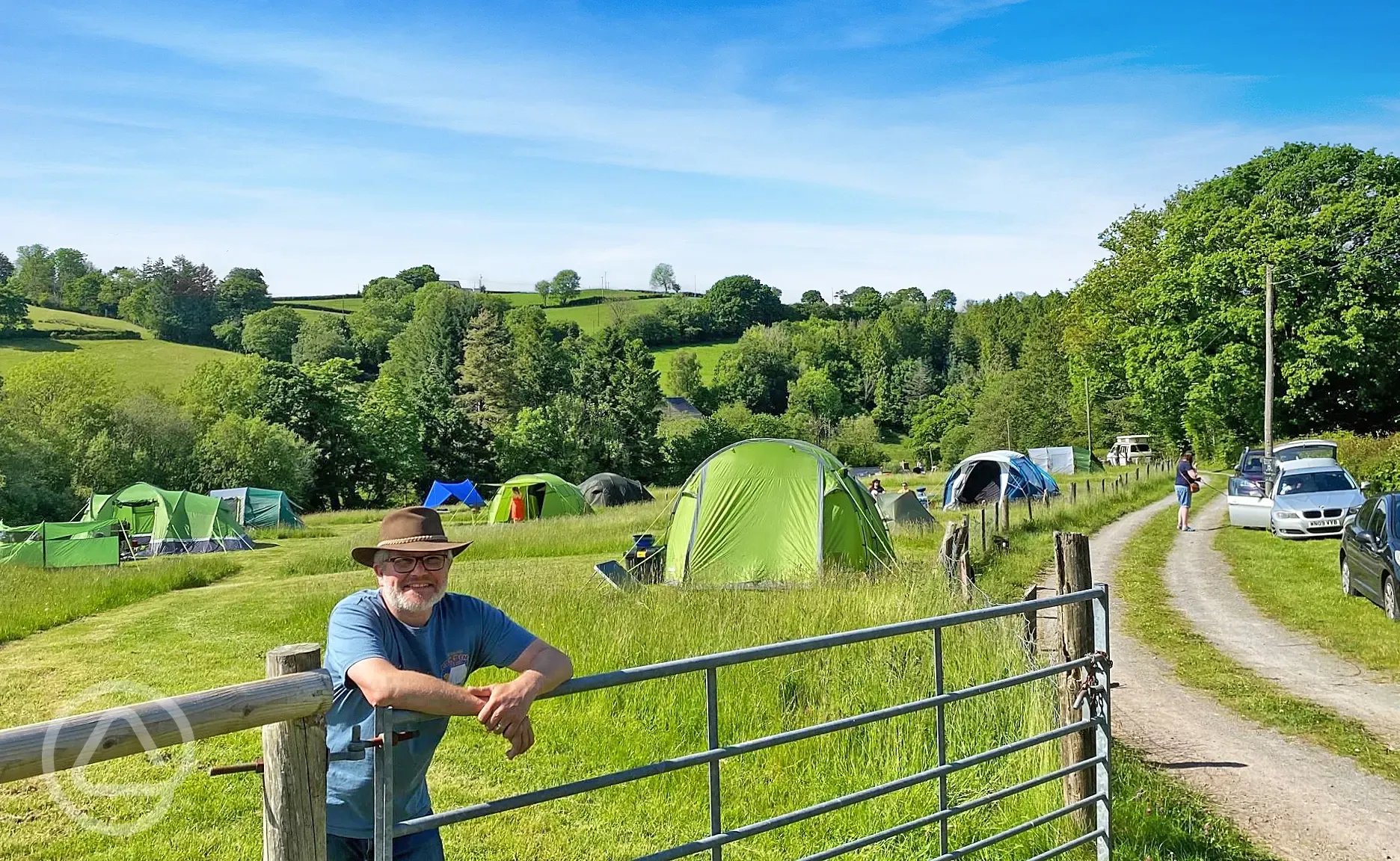 Non electric grass tent pitches with views of the countryside Non electric grass tent pitches with views of the countryside