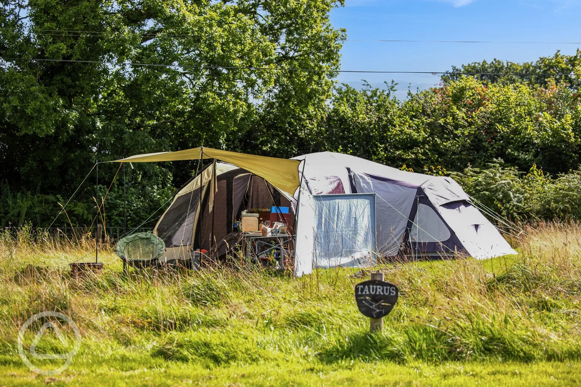 Non electric grass tent pitches, each sleeping up to five Non electric grass tent pitches, each sleeping up to five