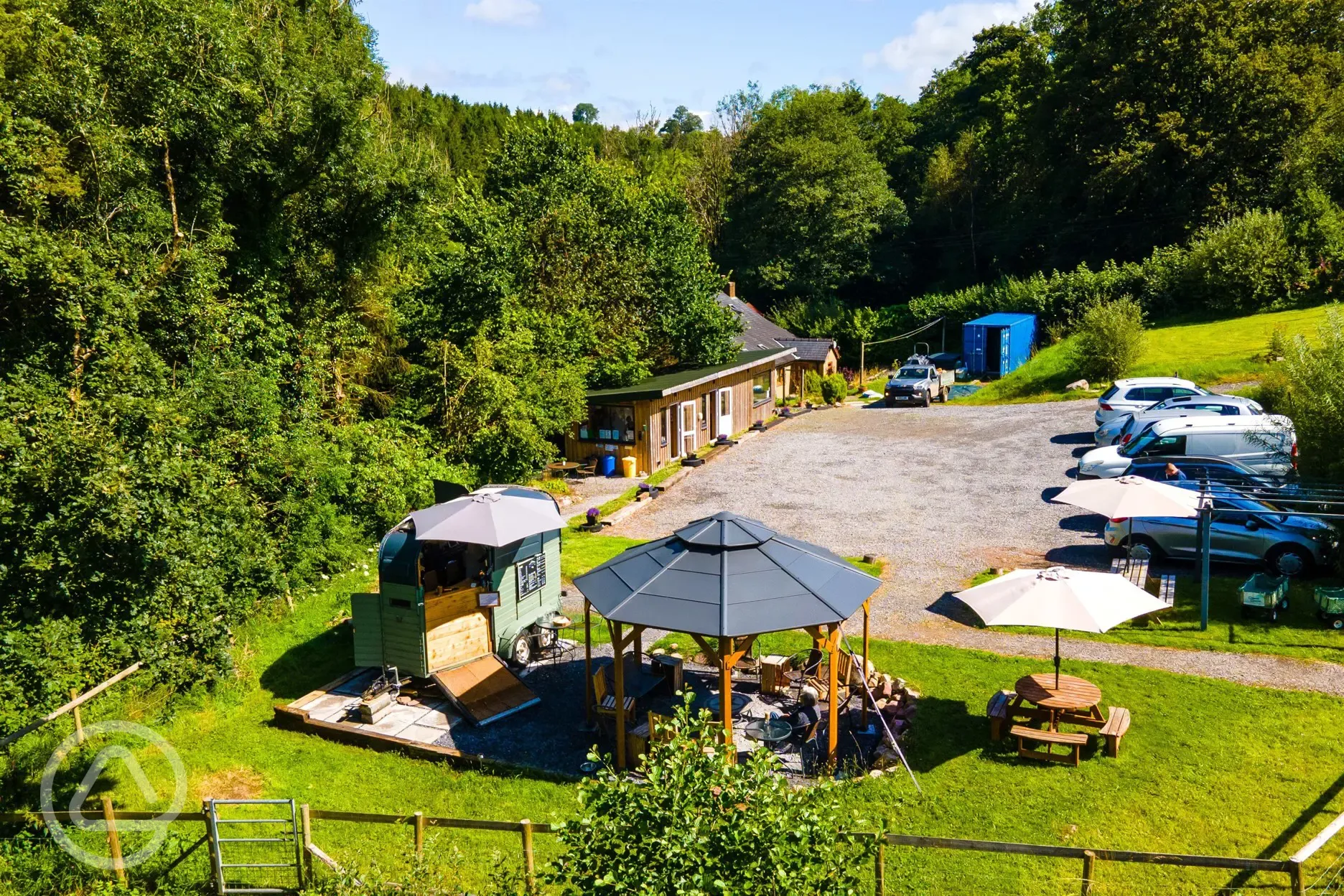 The Firepit Café and Bar and covered communal fire pit with seating The Firepit Café and Bar and covered communal fire pit with seating