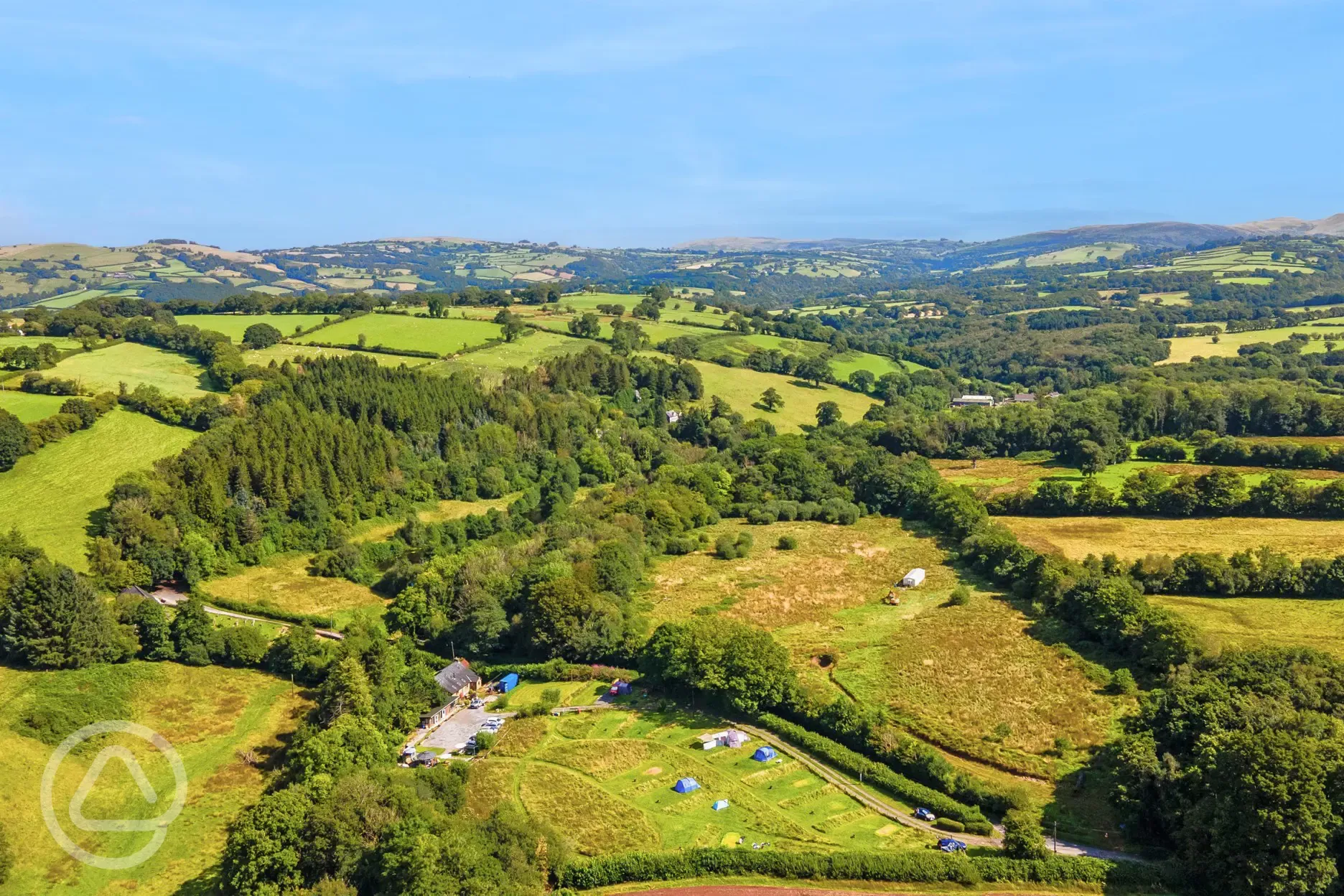 Aerial of the campsite surrounded by countryside Aerial of the campsite surrounded by countryside