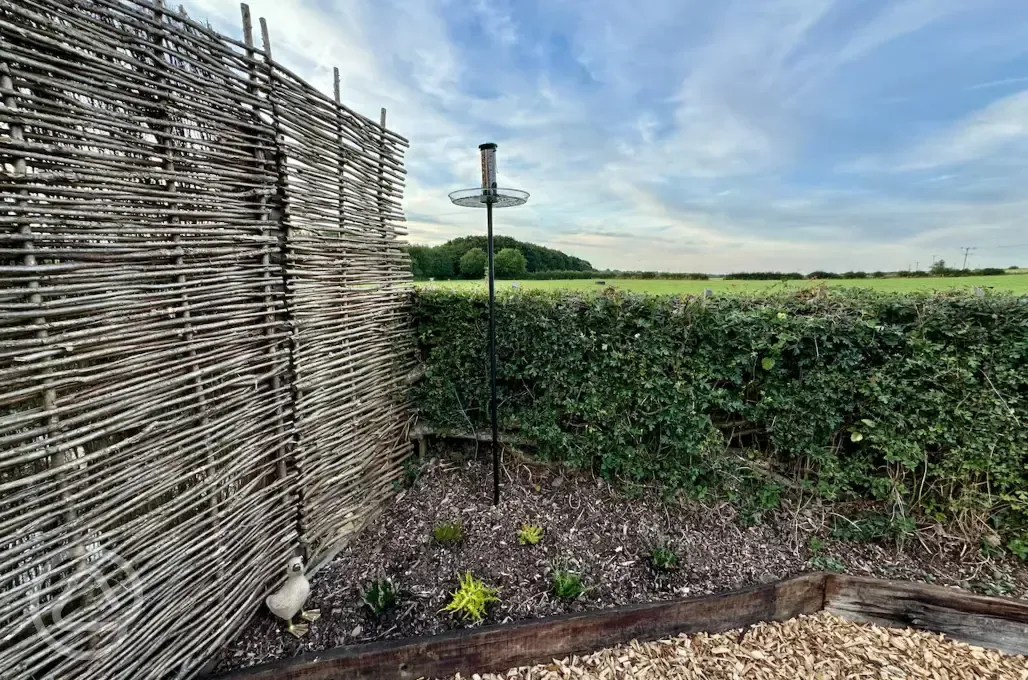 Copper Beech shepherd's hut garden