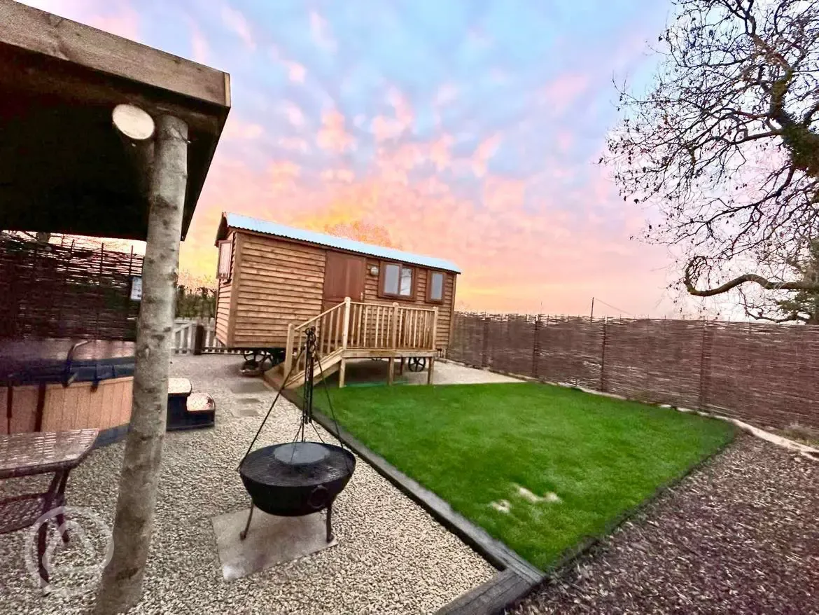 Willow shepherd's hut at sunset