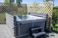 The hot tub on the decking of Chaplins Club