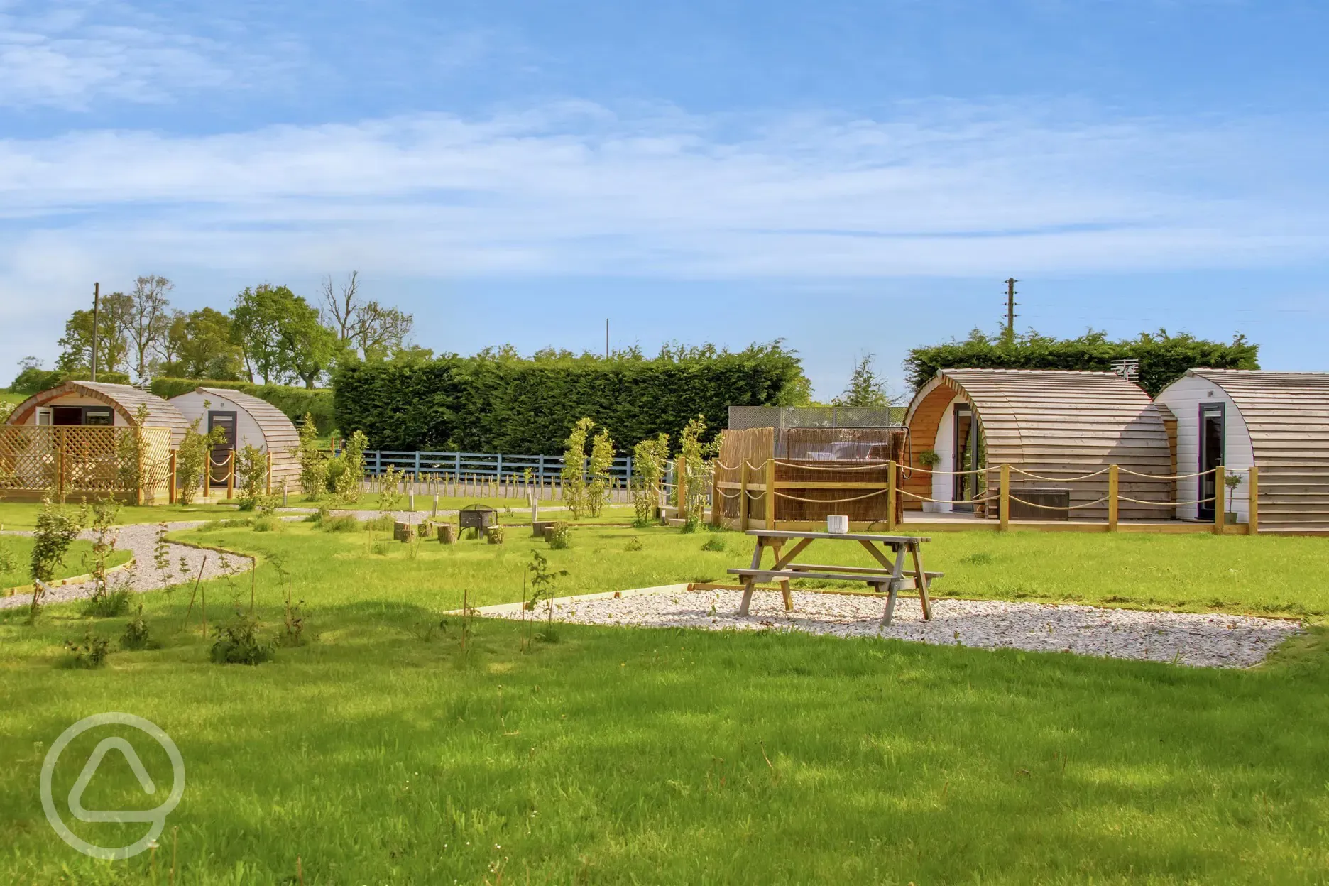 Glamping pods with outdoor seating