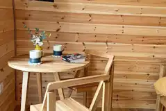 Glencroft pod dining table and TV with folding chairs