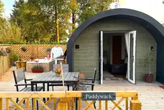 Paddywack pod with an outdoor dining area, electric hot tub and planting