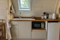 Bowcliffe kitchenette with a microwave, grill, fridge, sink and hob