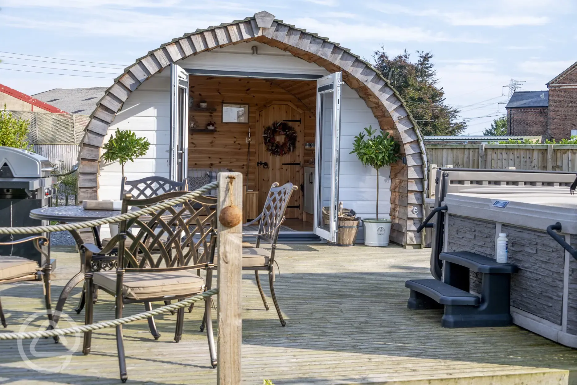 Chaplins Club pod and private decking with hot tub