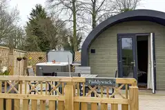 Paddywack glamping pod with a decking area and hot tub