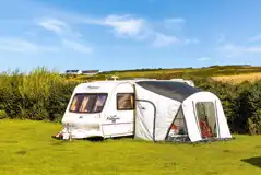 Non electric grass pitches with space for an awning