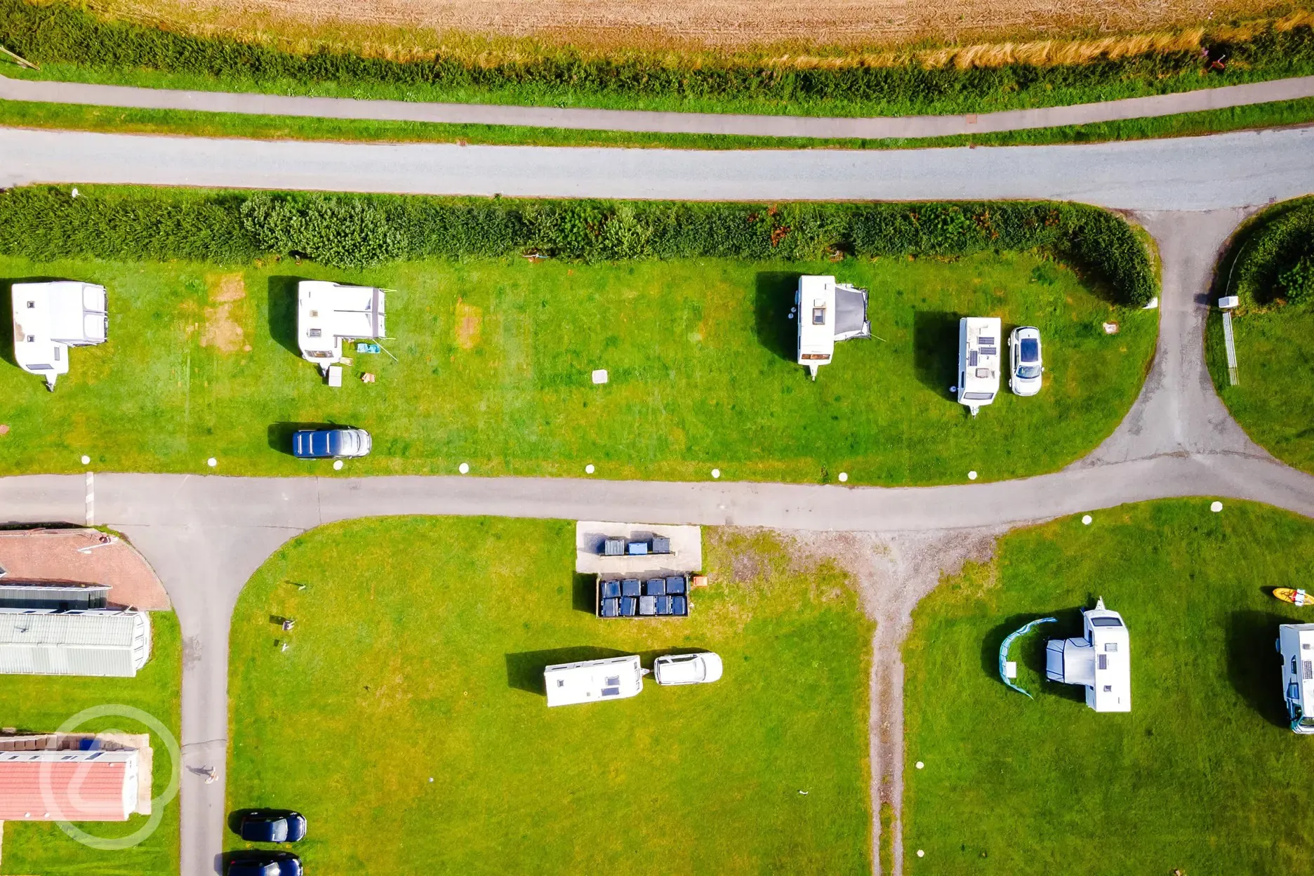 Bird's eye view of the non electric grass pitches at West Angle Bay 