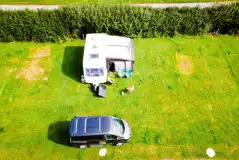A caravan with an awning on the non electric grass pitches