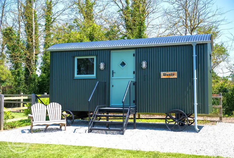 Rusty shepherd's hut at Bucket and Spade Holidays Touring