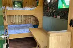 Woodie shepherd's hut interior with double beds