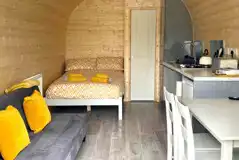 Bryn Hafod glamping pod interior with a double bed (bedding included) Bryn Hafod glamping pod interior with a double bed (bedding included)