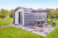 Ensuite glamping pods at Anglesey Holiday Pods with a private patio and seating Ensuite glamping pods at Anglesey Holiday Pods with a private patio and seating