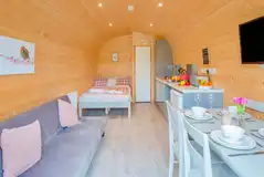 Cuddfan ensuite pod with a double bed and double sofa bed (bedding included) Cuddfan ensuite pod with a double bed and double sofa bed (bedding included)