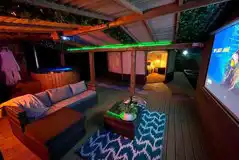 Deluxe yurt with hot tub outdoor seating area