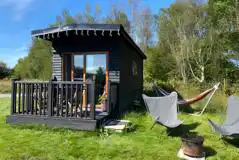 Caban Y Gors with a small deck and fire pit Caban Y Gors with a small deck and fire pit