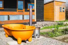 Caban Marta with a private garden and orange wood-fired hot tub Caban Marta with a private garden and orange wood-fired hot tub