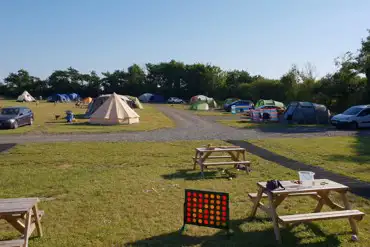Non electric grass tent pitches and games area