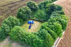 Aerial of the paddock, three grass pitches combined to make one large pitch