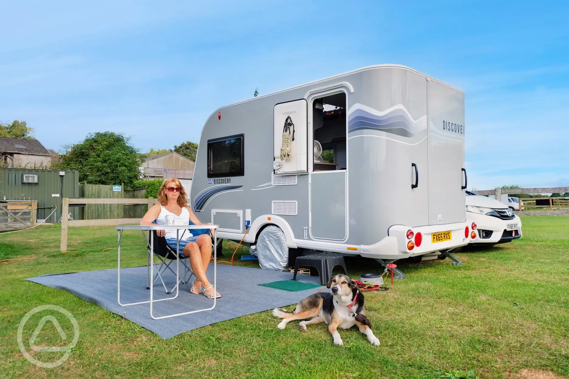 Electric grass pitches (main field) measuring 14m by 10m with 16amp hook up