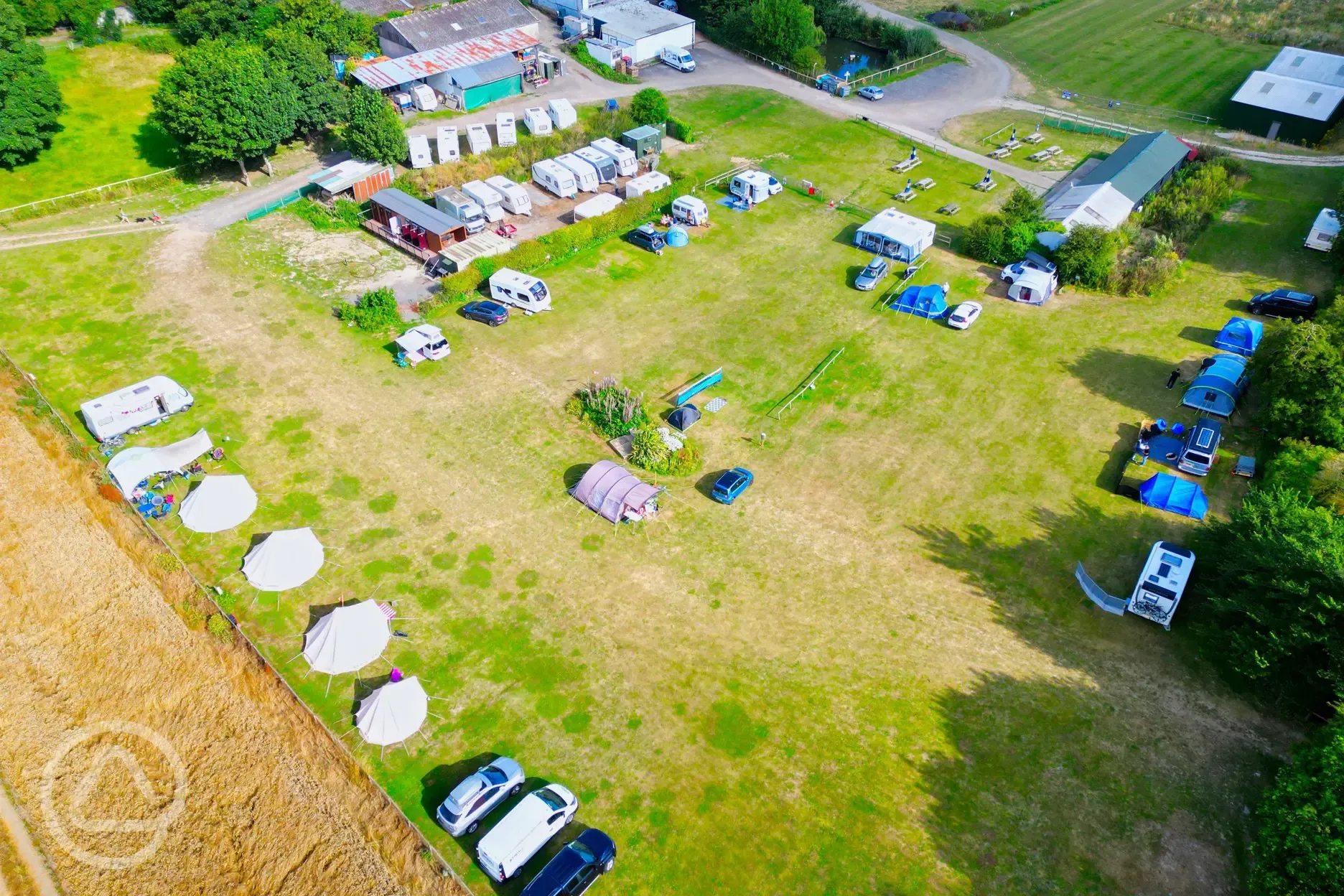 Aerial of pitches, facilities and pub at Solley's Ice Cream Campsite