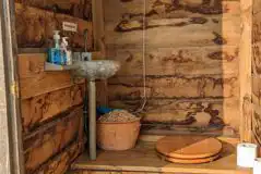 Compost toilet with a hand washing sink