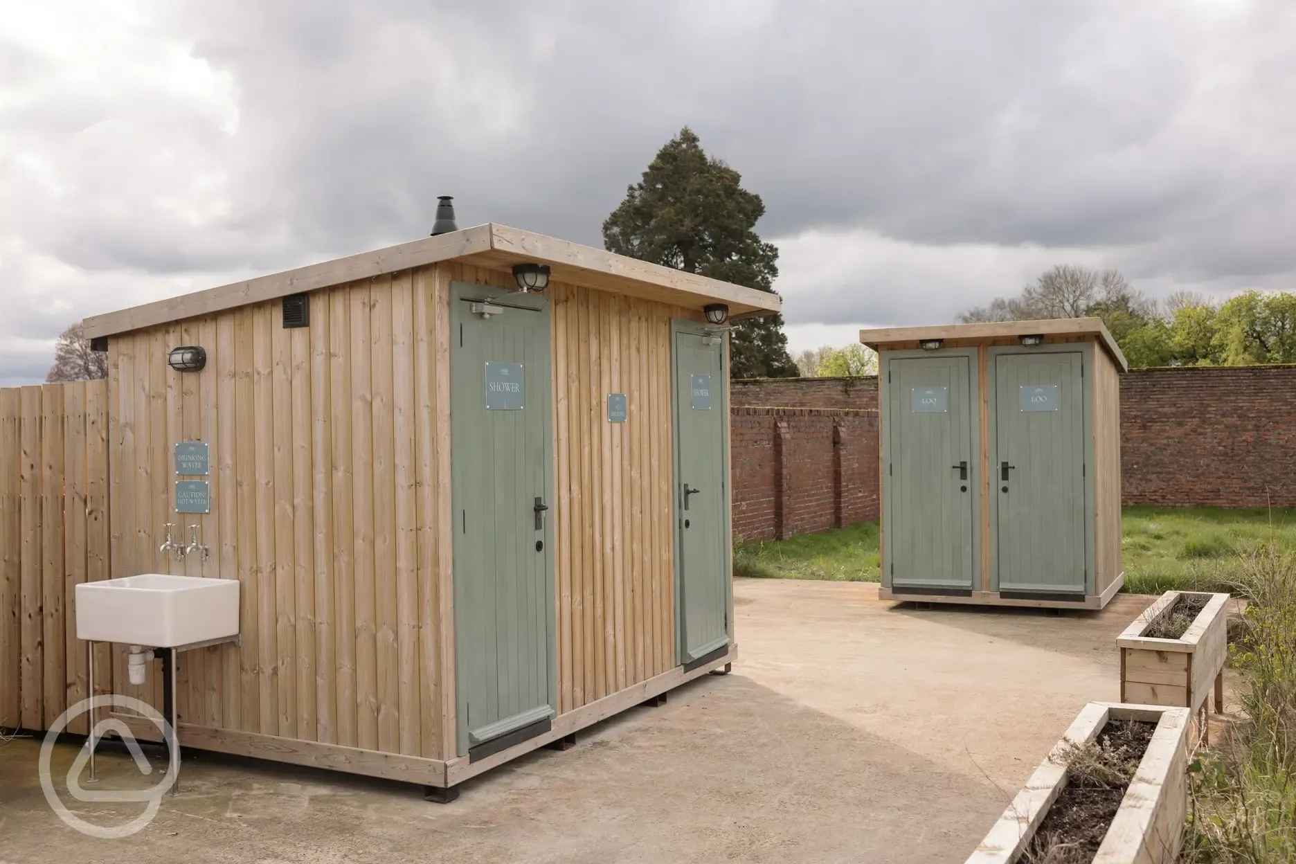 Toilet and shower block with flushing toilets, hot showers and hairdryers