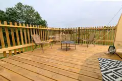 Lotus stargazer bell tent decking and outdoor furniture