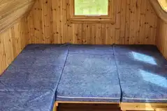Stargazer glamping pod interior with five fold out beds