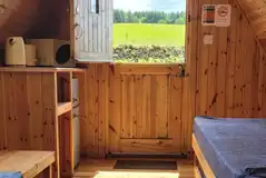 Stargazer glamping pod interior with microwave, toaster and kettle