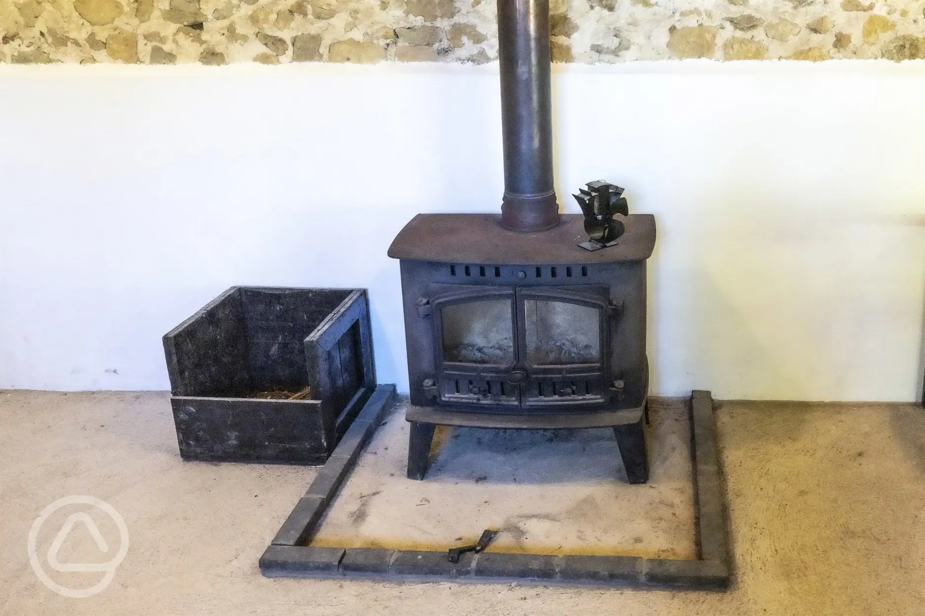 Woodburning stove in communal barn