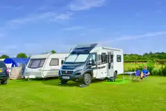 Electric grass pitches for tents, trailers, campervans, motorhomes and caravans