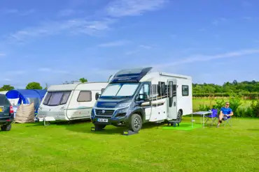 Electric grass pitches for tents, trailers, campervans, motorhomes and caravans