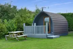 Family glamping pod with decking and picnic bench (four persons) Family glamping pod with decking and picnic bench (four persons)