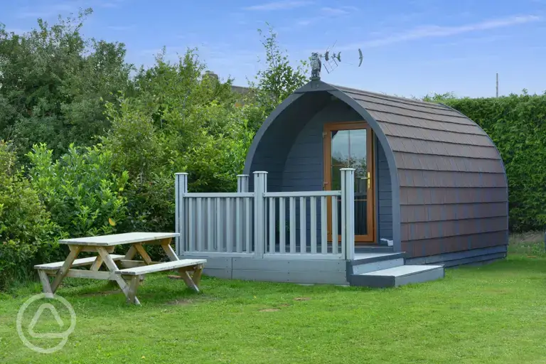 Family glamping pod with decking and picnic bench (four persons)