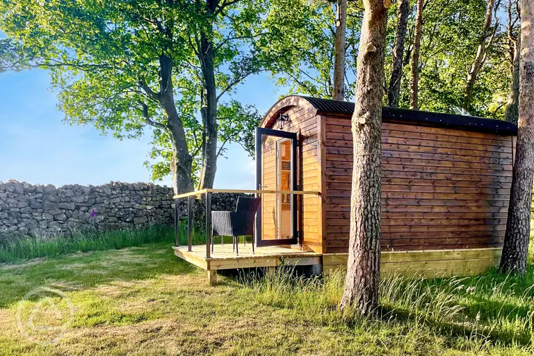 Carrock Fox shepherd's hut with outdoor decking and seating