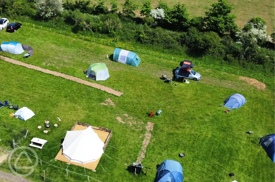 Aerial of the bell tent and non electric grass pitches