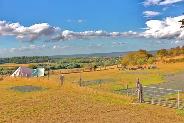 Bell tent on grass pitches (optional electric) overlooking countryside views 