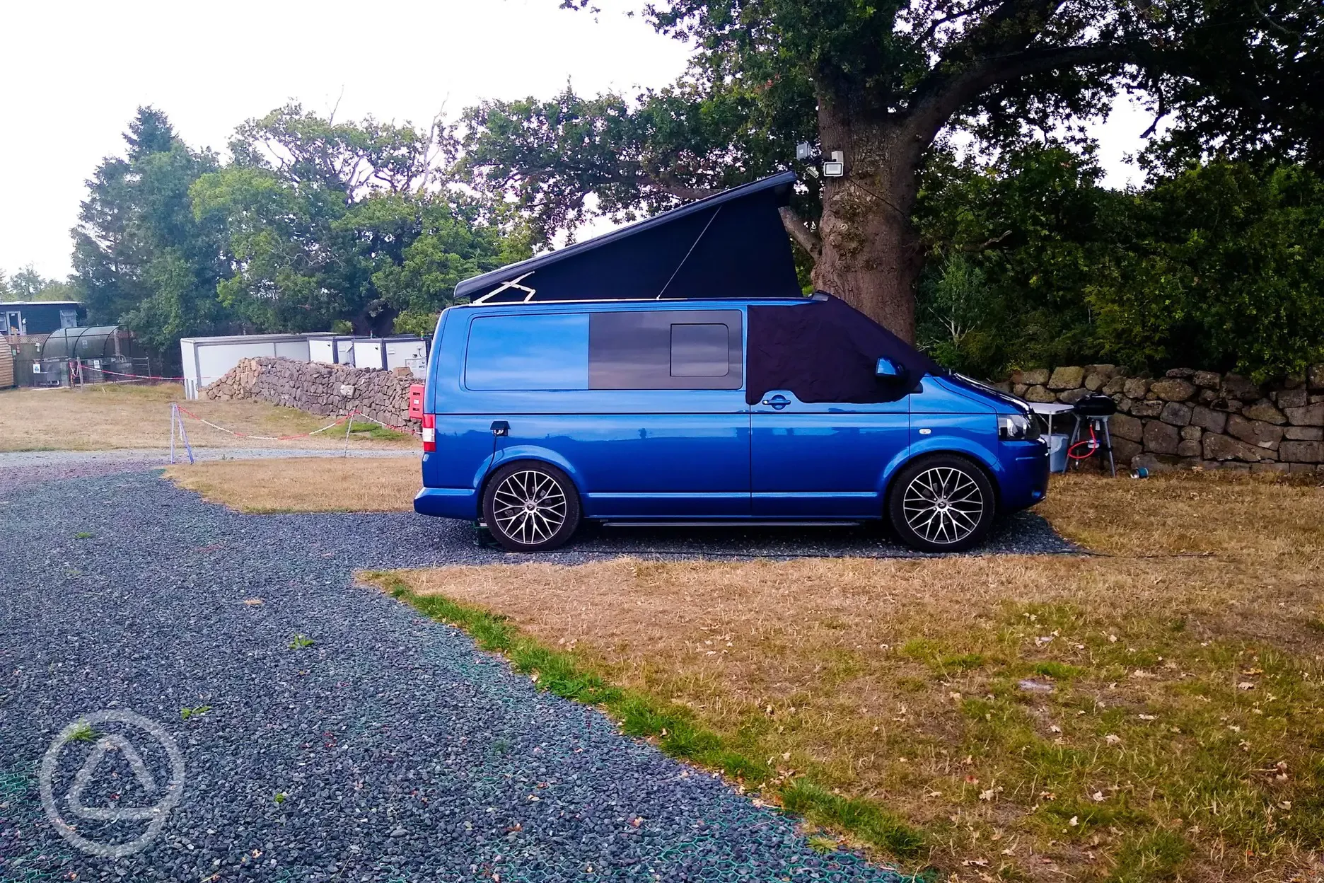 Small campervan on all weather hardstanding (optional electric) Small campervan on all weather hardstanding (optional electric)