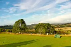Small tent on pitch 10 with countryside views (optional electric) Small tent on pitch 10 with countryside views (optional electric)
