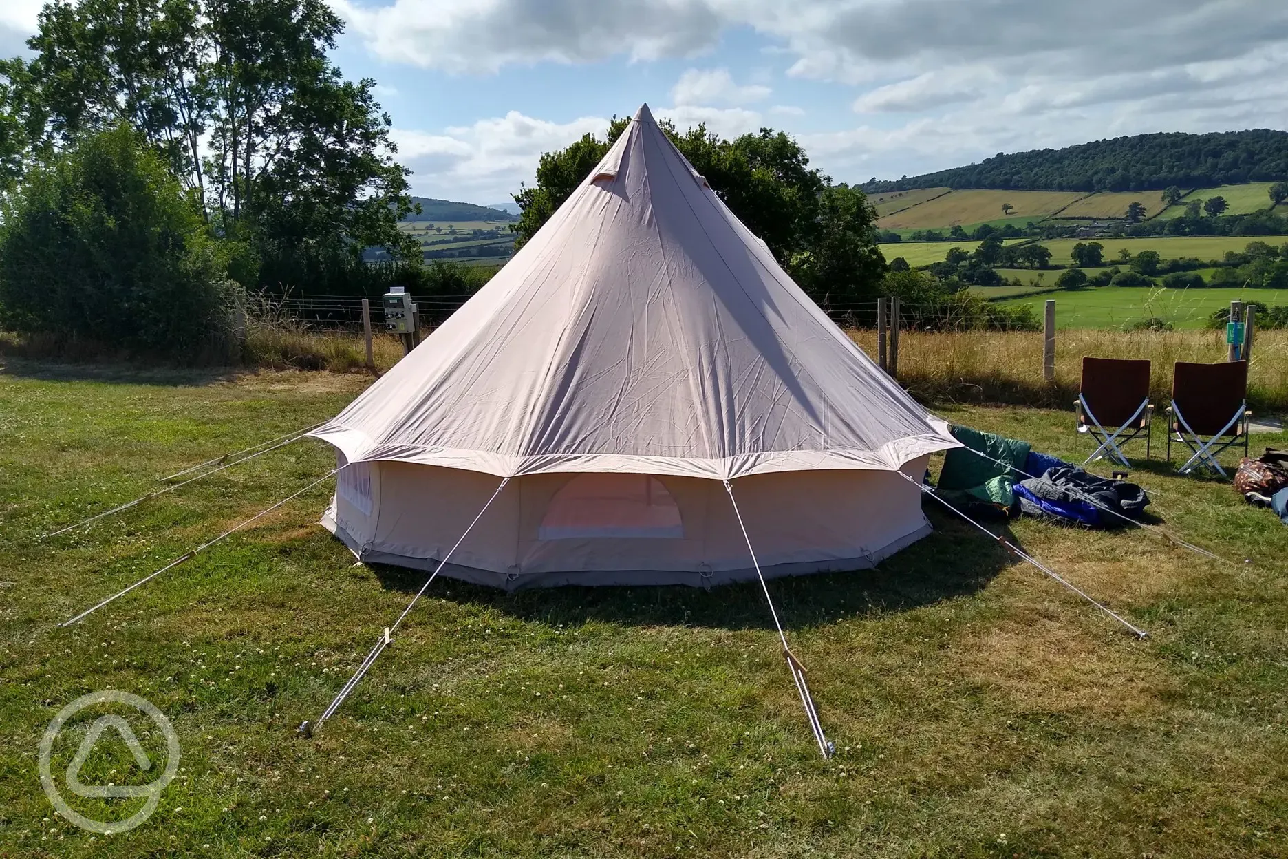 Bell tent on grass pitches (optional electric) Bell tent on grass pitches (optional electric)